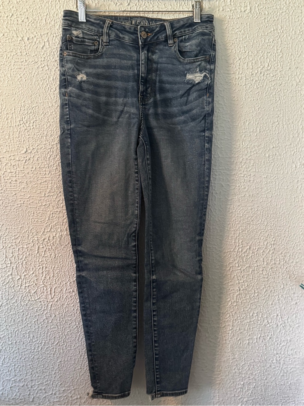 American Eagle Outfitters Women’s Faded Blue Distressed Hi-Rise Skinny Jeans